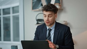 Boss complaining on video call by laptop feeling nervous closeup. Dissatisfied businessman throwing papers arguing at online meeting in office. Angry manager discussing problem emotionally in web chat - Powered by Shutterstock - Get 15% off with code: PIKWIZARD15