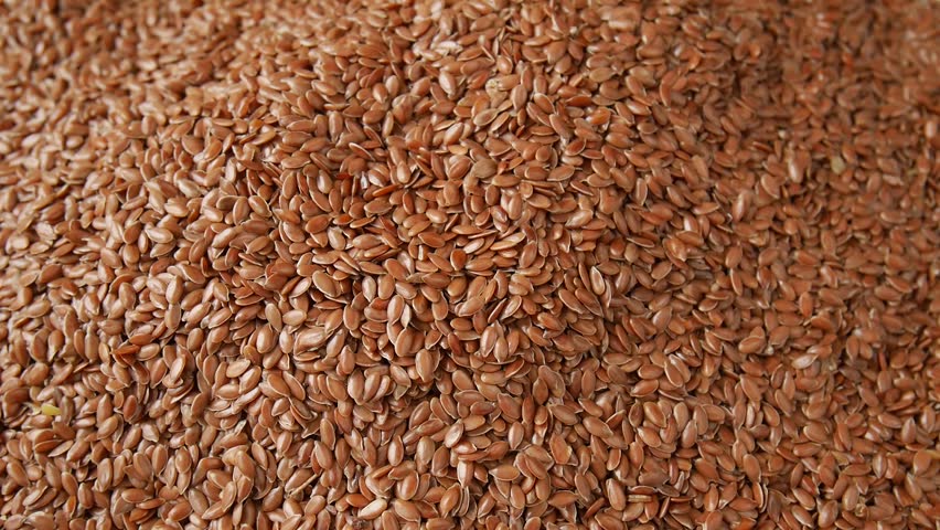 Pour flax seeds into a plate.