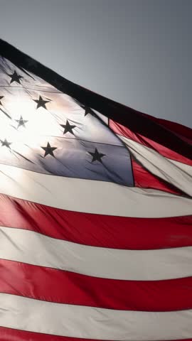 Vertical American Flag Waving in the Wind.