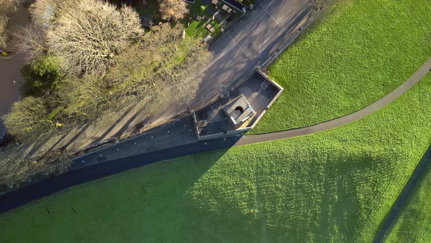 Overhead aerial of The Derry Walls in Derry-Londonderry, Northern Ireland on a bright sunny day. Filmed in 4K at 30fps with Rec709 color.