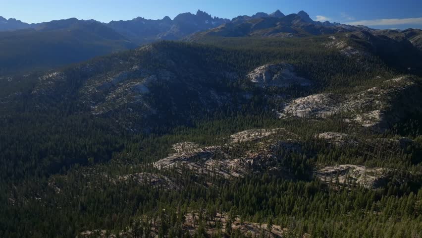 Minarets Vista Banner Peak Mammoth Mountain Lakes Sierras PCT Trail aerial drone California daytime morning afternoon blue sky clouds nature landscape Pacific Crest Trail Ridge forward pan up motion