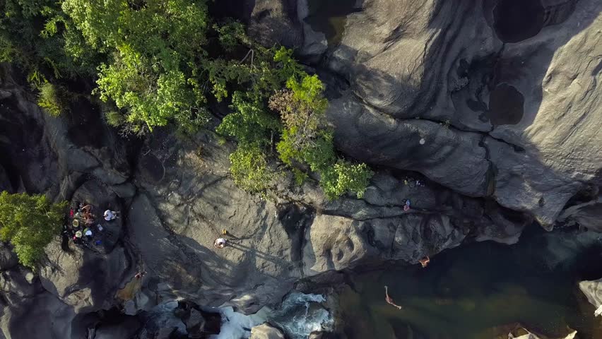 Aerial drone shot descending from above, revealing the breathtaking landscapes of Vale da Lua in Chapada dos Veadeiros, Brazil