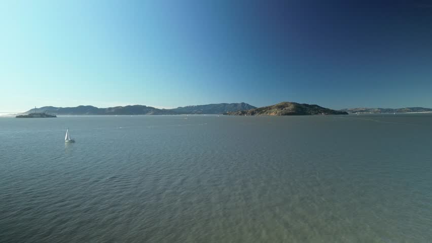 Pan drone shot of Treasure Island in the day with North Pacific Ocean in California, USA
