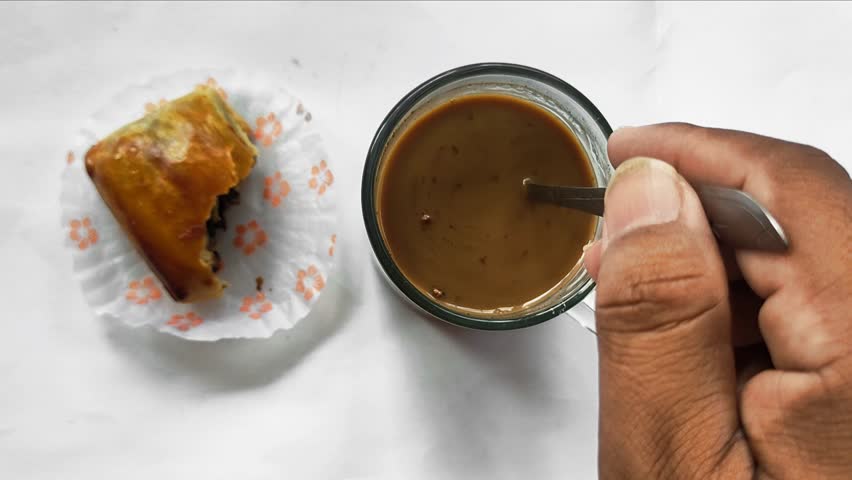 A Sweet Escape: A Cup of Coffee and a Delectable Slice of Chocolate Banana Bolen, a Perfect Moment of Indulgence - Powered by Shutterstock - Get 15% off with code: PIKWIZARD15