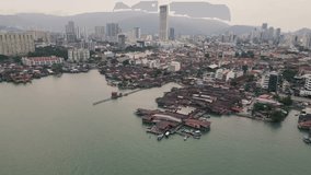 Aerial of George Town in Penang Island Malaysia with Jetties residential unesco neighbourhood street art graffiti - Powered by Shutterstock - Get 15% off with code: PIKWIZARD15