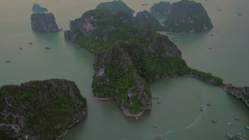 Overhead drone shot of Vietnam's unique Ha Long Bay mountains.
