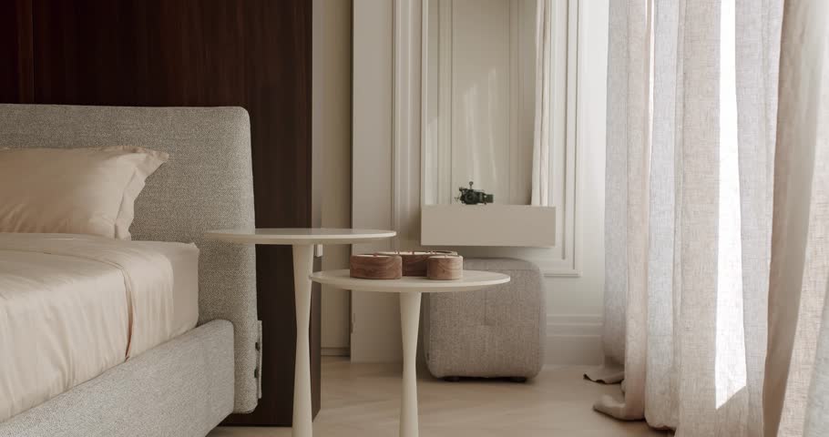 Contemporary bedroom interior showcasing stylish furniture, neutral color palette, and natural light. Perfect representation of modern living and design. Modern Bedroom Interior With Stylish Furniture