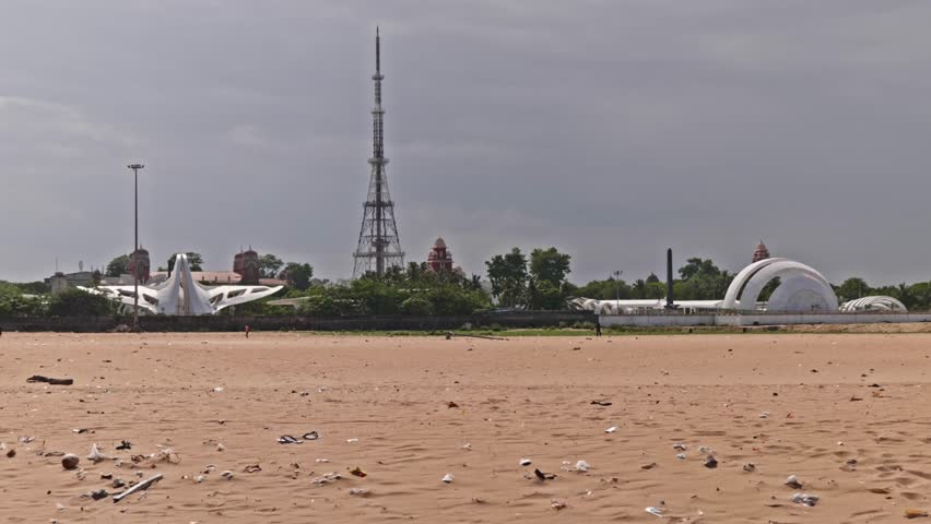 M. Karunanidhi Memorial, J. Jayalalithaa Memorial with signal tower and University of Madras view from marina beach, chennai, tamil nadu, india. day time, stable shot, 4k.
