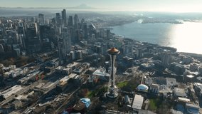 Scenic aerial view of Space Needle with Seattle cityscape on bright, sunny day - Powered by Shutterstock - Get 15% off with code: PIKWIZARD15