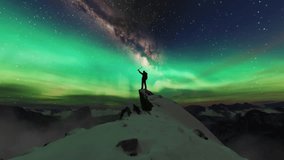 Hiker on Mountain Top with Aurora Borealis and Milky Way. 3D Rendering. - Powered by Shutterstock - Get 15% off with code: PIKWIZARD15