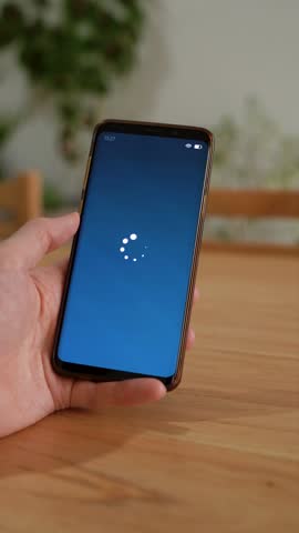 Invoice paid notification on smartphone app. Vertical shot.