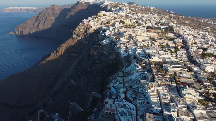 Fira Centre at sunrise - Greece. Looking up with my drone, giving a incredible perspective of the Island.