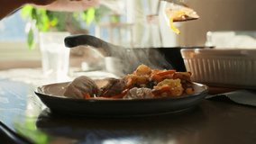 Serving food in slow motion with peppers falling from above onto a plate of delicious food - Powered by Shutterstock - Get 15% off with code: PIKWIZARD15