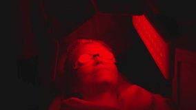 Relaxing red light therapy session in a soothing wellness environment - Powered by Shutterstock - Get 15% off with code: PIKWIZARD15