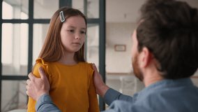 Caring Caucasian guy man parent touching offended frustrated little girl schoolgirl child quarrel dad male supporting frustrated daughter at home father comfort little kid family problem fatherhood - Powered by Shutterstock - Get 15% off with code: PIKWIZARD15