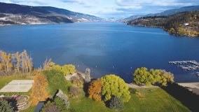 Beautiful Lakeside Autumn Colored Trees in Canadian Provincial park Overlooking Calming Serene Wood Lake Horizon. Okanagan, British Columbia. Tranquil Nature Landscape. Lakecountry, BC, Canada - Powered by Shutterstock - Get 15% off with code: PIKWIZARD15