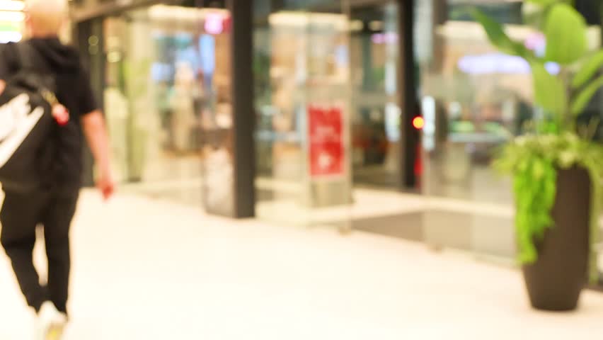 People entering a mall in Bangkok, Thailand