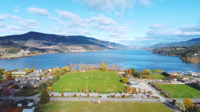 Peaceful Lakeside Autumn Colored Leaves on the Ground of Canadian Provincial park Overlooking Wood Lake Horizon. Okanagan, British Columbia. Tranquil Nature Landscape. Beasley, Lakecountry, BC, Canada