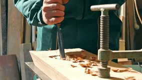 carpenter processing timber in his carpentry workshop,video clip ; Woodworking 