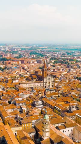Vertical video. Piacenza, Italy. Cathedral of Piacenza. Episcopal Palace. Historical city center. Summer day, Aerial View, Point of interest. Rich colors