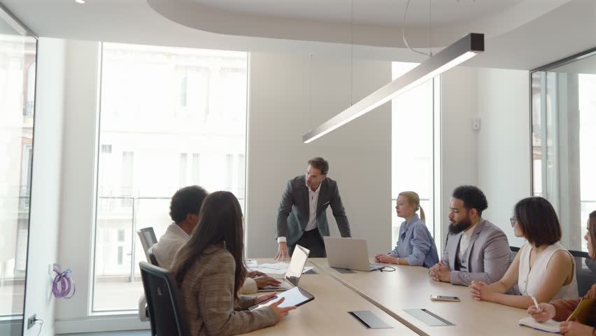 Skilled team meets in conference room to analyze complex financial data and sales reports, key aspects for effective decision making, planning, and innovative solutions for success. Angry boss concept