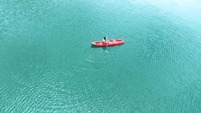 Asain woman attractive tourist rowing kayak in the sea journey on summer vacation - Powered by Shutterstock - Get 15% off with code: PIKWIZARD15