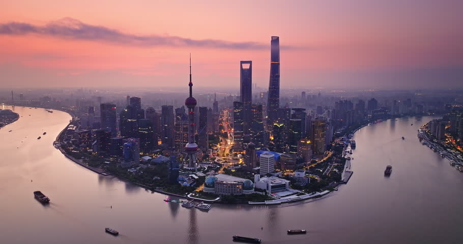 Aerial view of shanghai skyline at dusk with dramatic sky