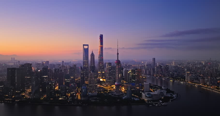 Aerial view of Shanghai skyline and skyscrapers at twilight