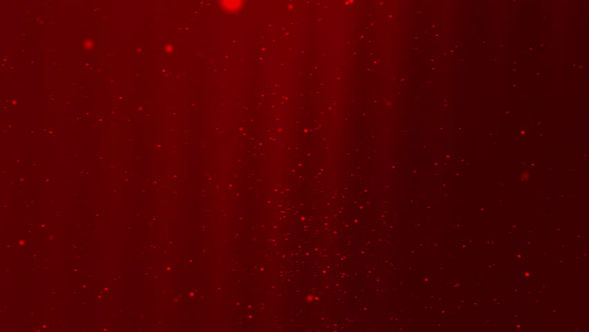 Red scattered particles on a vibrant background. Perfect for festive designs, holiday promotions, or dynamic backgrounds in various creative projects.