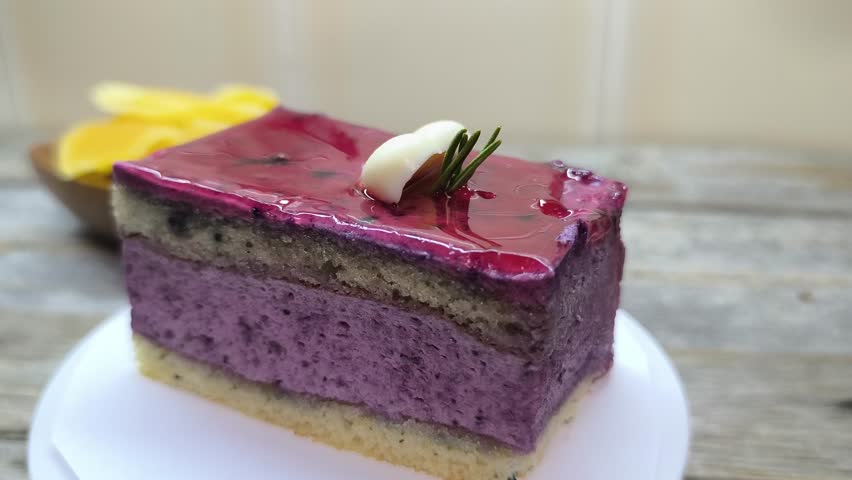 Tender juicy blueberry cake lies on a plate