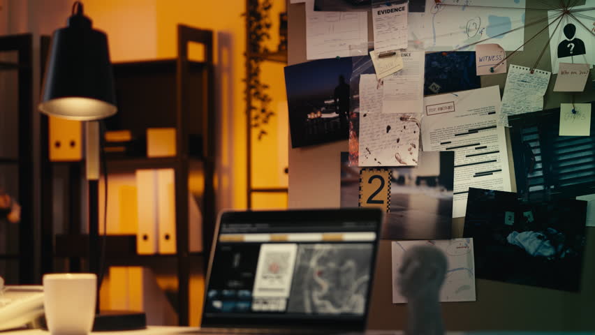 Police software runs on a laptop with an investigation board on background