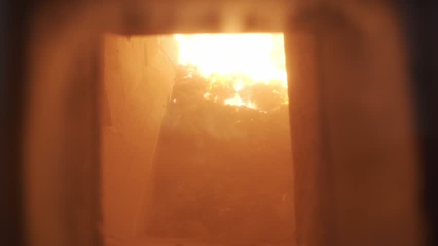 Inside view of an active waste incinerator with fire