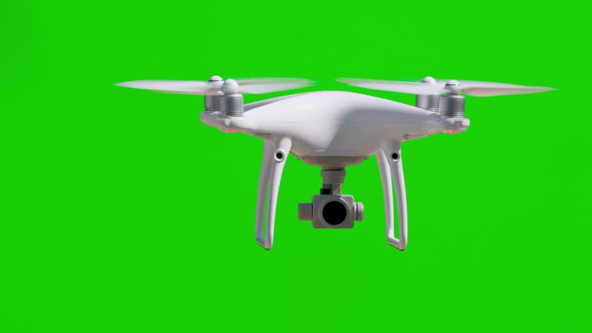 Real UAV Quadcopter Drone Flying Slow Motion Outdoors in Front of a Green Screen.
