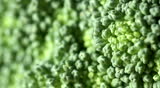Macro details of a broccoli floret with shallow depth of field and a focus pull.