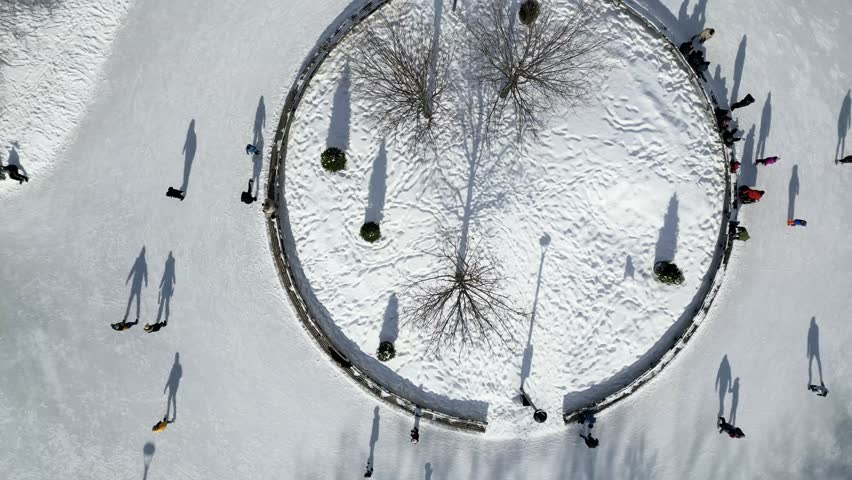View of the skating rink and downtown in winter from Mont Royal, Montreal. Quebec, Canada