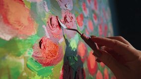 Experienced artist creating vibrant floral painting, using palette knife for layering rich textures and dynamic colors on canvas with professional artistic precision - Powered by Shutterstock - Get 15% off with code: PIKWIZARD15