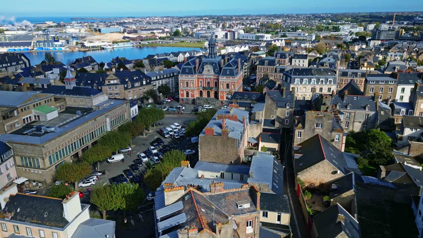 Ancienne Mairie Saint-Servan or old town hall of Saint Servan with place Bouvet and its theatre. Saint-Malo, Brittany in France. Aerial drone sideways