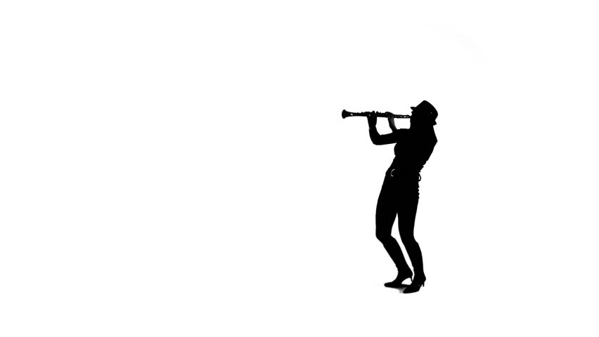 Young woman dance as she plays the clarinet in a white studio. Black and white