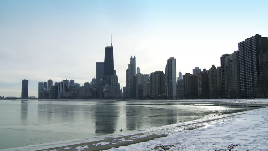 Chicago in winter, viewed from the north side with part of Lake Michigan. Snowy