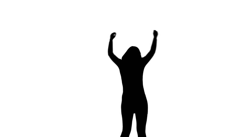 Silhoutted young woman clapping. Black and white medium long shot (MLS) isolated