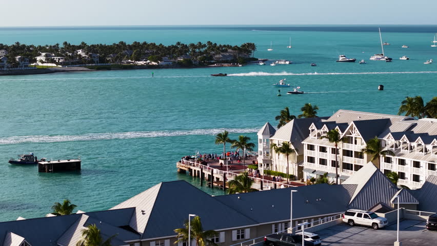 AERIAL: Helicopters filming racing boats on the coast of Key West, Florida, USA