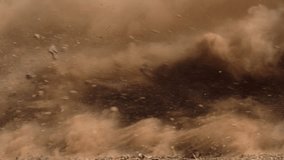 Explosion with flying debris, dust cloud, rock fragments, landslide, Slow-motion, copy space - Powered by Shutterstock - Get 15% off with code: PIKWIZARD15