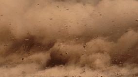 Massive dust and debris cloud, dramatic and chaotic scene, ideal for disaster, action, and cinematic effects. Slow-motion, copy space - Powered by Shutterstock - Get 15% off with code: PIKWIZARD15