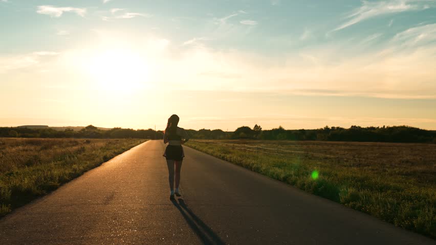 silhouette sports girl running along road sunset, ready triathlon, fight victory, sportswear, urban marathon runner crossing finish line, woman runs, athletic body, athlete legs rest, outdoors sunny