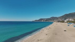 Aerial Video Alanya Beach With Bright Azure Water And Smooth Sand, A Perfect Summer Scene Under The Clear Blue Sky - Powered by Shutterstock - Get 15% off with code: PIKWIZARD15