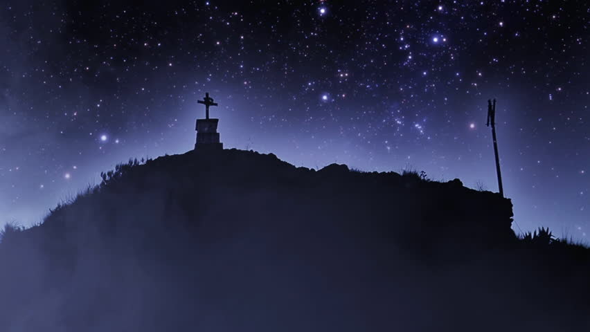 Meteor Falling Over a Misty Hill With a Catholic Cross Shrine at Night