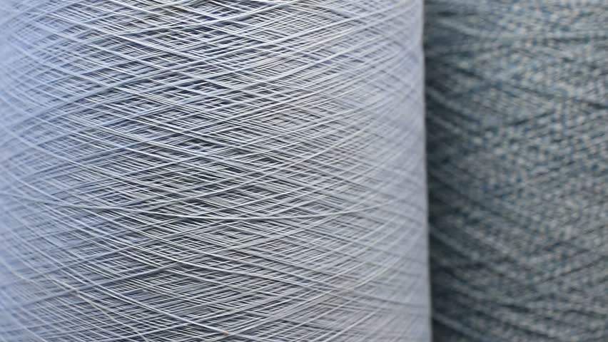 Spools of Thread. Yarn Textile Industry Background
