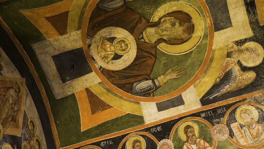 Panning to the images of Jesus and the disciples inside the church of St. Teodor Tiron and St. Teodor Stratilat in the village of Dobarsko, Bulgaria.