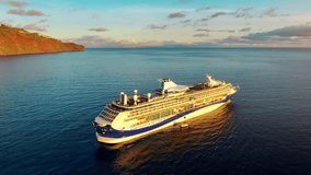 Luxury cruise ship navigating calm ocean waters during a stunning sunset, showcasing an unforgettable travel experience - Powered by Shutterstock - Get 15% off with code: PIKWIZARD15