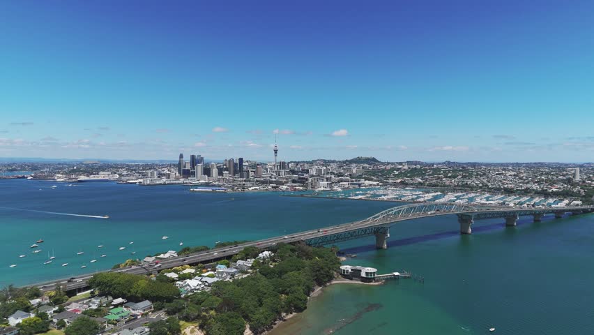 Auckland city centre with Westhaven Marina, sunny day. Aerial